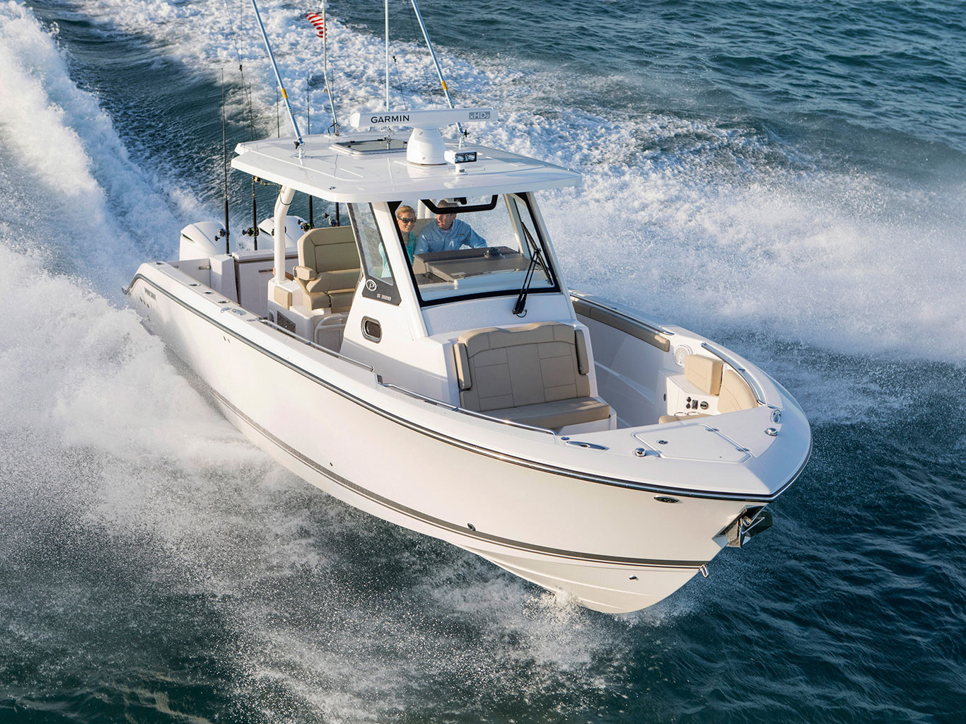 Pursuit S 328 center console running offshore on the Gulf of Mexico