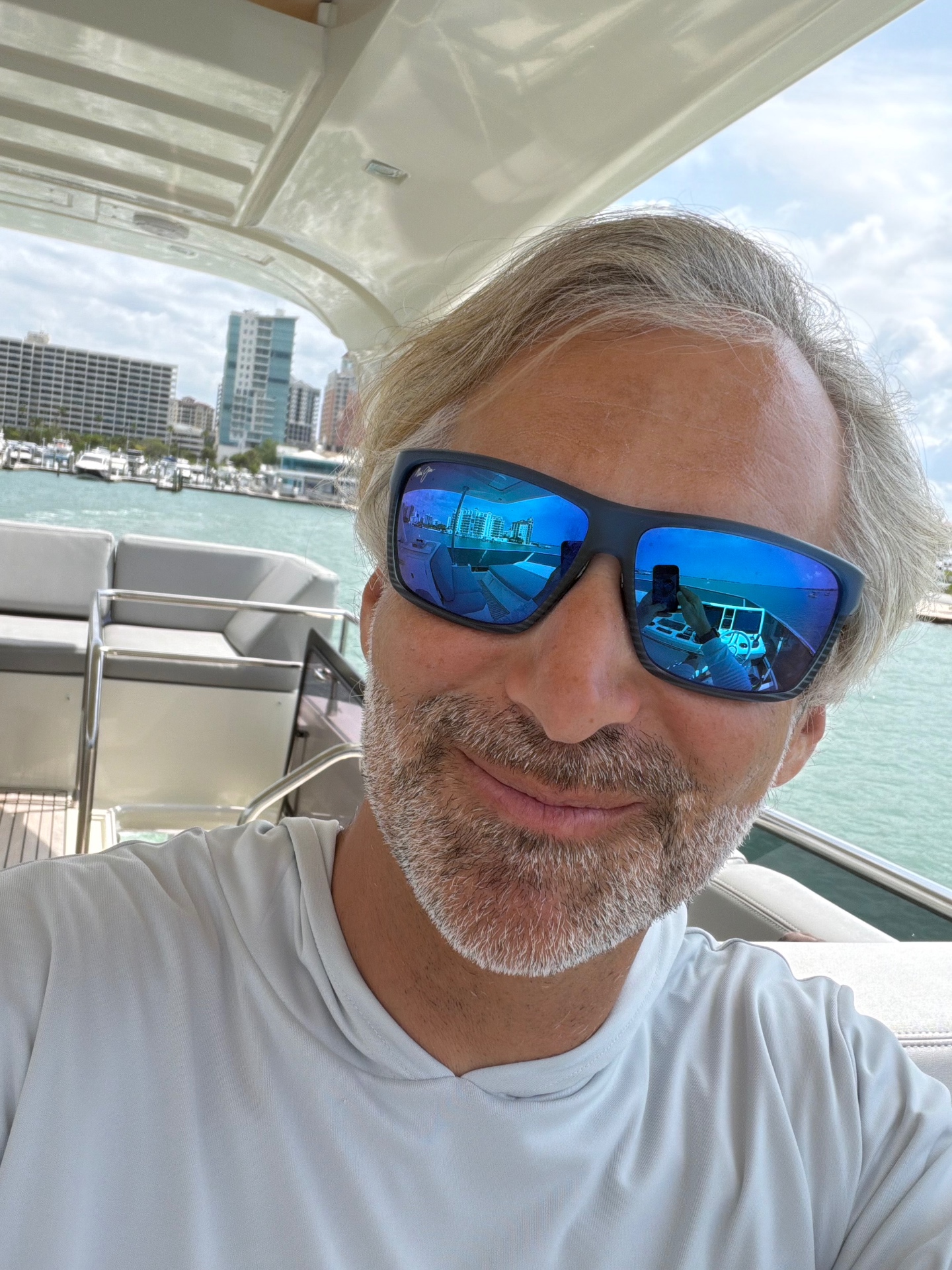 Capt. Zac Oppenheim on a boat near the St. Petersburg waterfront